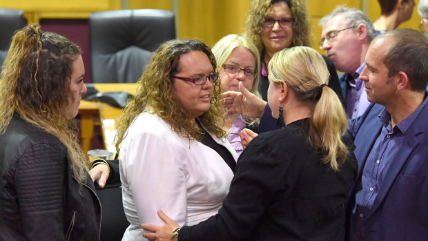 Cr Kerry Silver (left) is seen following the Ipswich City Council's final meeting.