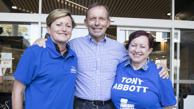 Christine Forster, pictured campaigning for her brother Tony Abbott with her wife Virginia Edwards last month.