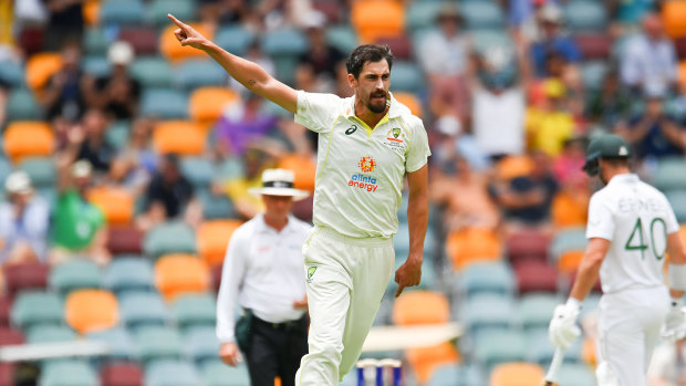 Mitchell Starc celebrates his 300th Test wicket on Sunday in Brisbane.