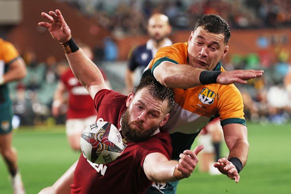 Luke Cowan-Dickie, left, of the British & Irish Lions and David Havili of the AUNZ Invitational XV compete for the ball