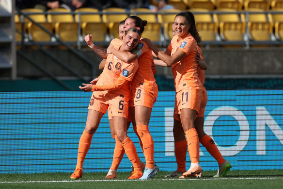 Jill Roord, first on left, of Netherlands celebrates with teammates after scoring.