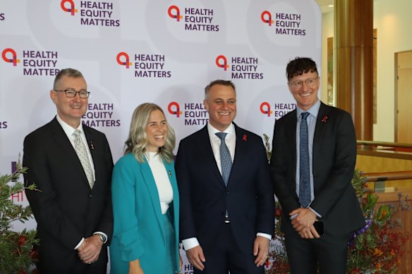 (From left) Health Equity Matters’ Mark Orr, Labor’s Renee Coffey, Liberal MP Tim Wilson, and Dash Heath-Paynter of Health Equity Matters at a World AIDS Day breakfast at Parliament House.