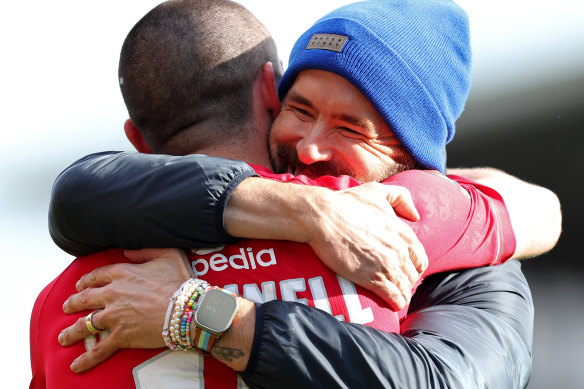 Owner Ryan Reynolds hugs Eoghan O’Connell after the 3-2 win.