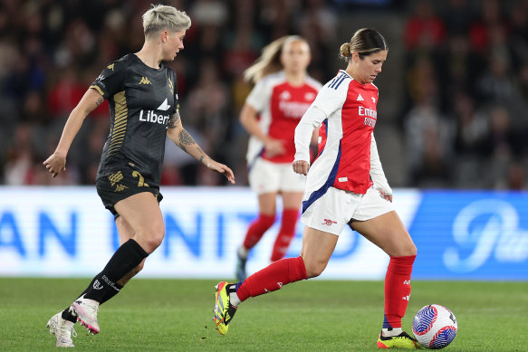 Kyra Cooney-Cross of Arsenal is chased by A-League All Stars Women’s Michelle Heyman.