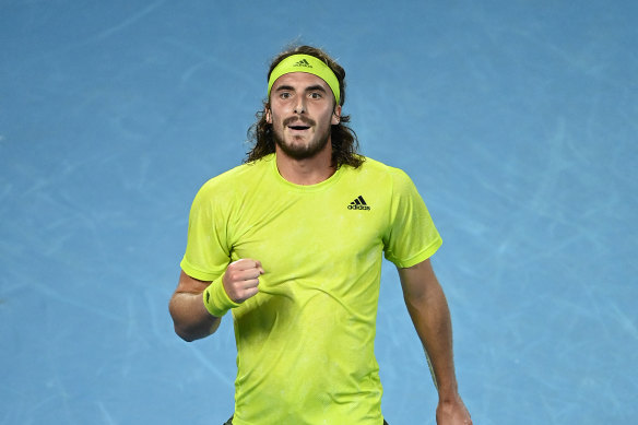 Stefanos Tsitsipas celebrates after defeating Rafael Nadal.