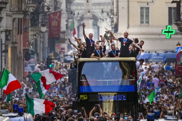 Italy’s victorious Euro 2020 squad take to the street in Rome.