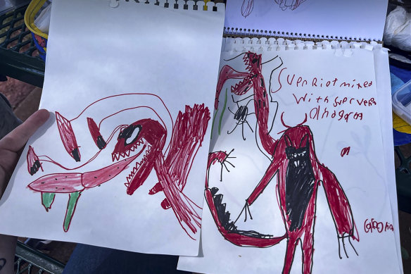 In an undated photo provided by Nicole Sims, disturbing drawings by her son, now 8, who suffered nightmares and hallucinations of a woman in the window, while he was taking the asthma drug Singulair, now a generic.