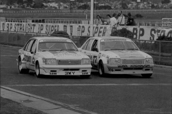 The cars thunder around Mt. Panorama.