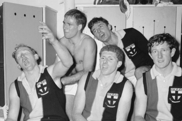 An ecstatic Darrell Baldock (left) bursts into song after leading St Kilda to its victory over Melbourne.