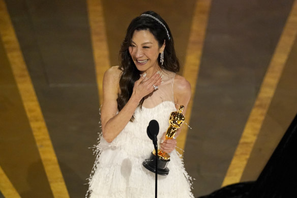 Michelle Yeoh accepts the award for best actress for Everything Everywhere All at Once.