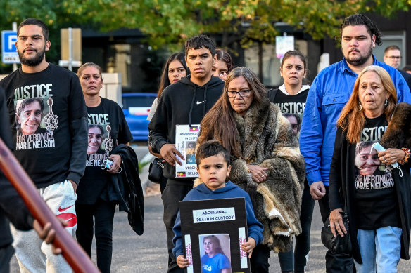 Donna Nelson, mother of Veronica Nelson, with family and friends before the inquest.