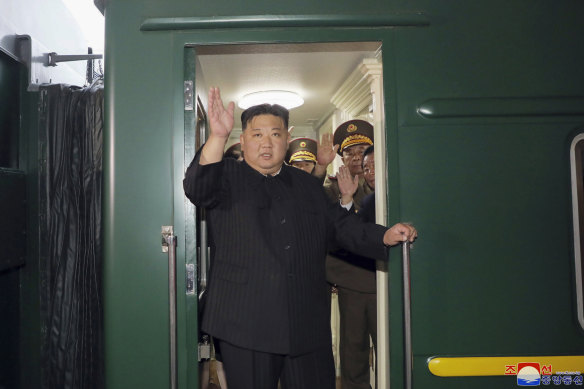 North Korea leader Kim Jong-un waves from a train in Pyongyang, as he leaves for Russia.