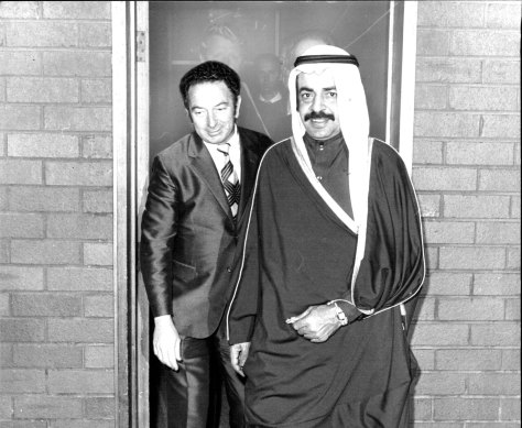 Sheikh Khalifa bin Salman Al-Khalifa is met by minister  Mr W Haigh on arrival in Sydney on a state visit in 1976. 