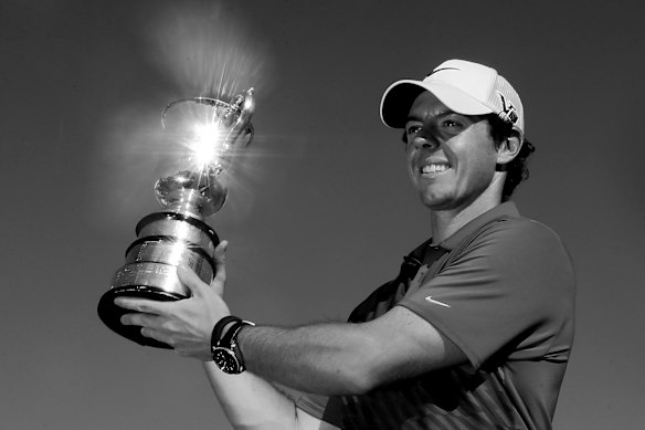 Rory McIlroy celebrates his 2013 Australian Open win.