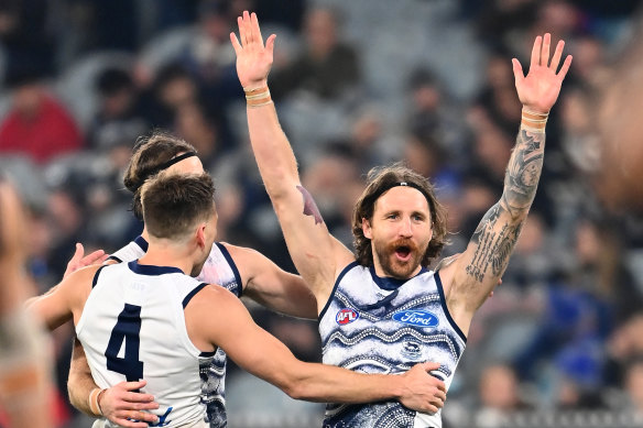 Zach Tuohy celebrates after scoring for the Cats in their win over Carlton.
