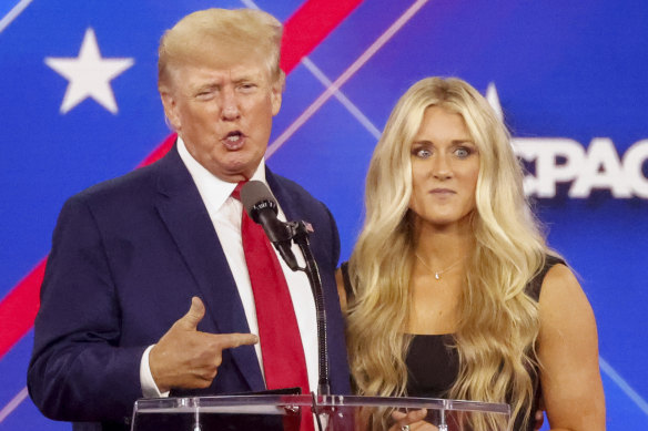 Forrmer president Donald Trump with
champion swimmer Riley Gaines during the Conservative Political Action Conference (CPAC) in Dallas, on August 6.