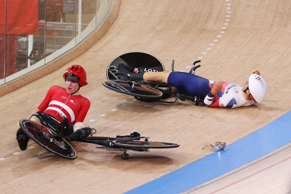 Denmark’s Frederik Madsen and Charlie Tanfield of Great Britain after their crash on Tuesday.
