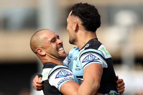 Will Kennedy celebrates the Sharks' try on Easter Sunday.