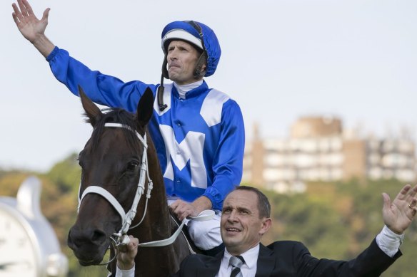 Final bow: Hugh Bowman and Chris Waller with Winx after the Queen Elizabeth Stakes.