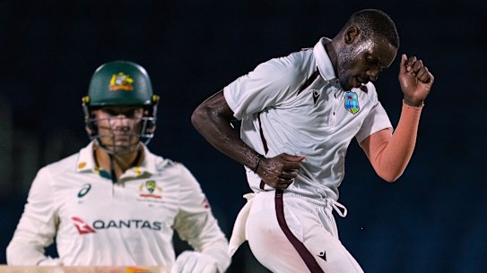 Justin Greaves celebrates taking the wicket of Alex Carey.