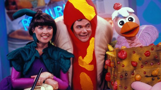 Daryl Somers with co-host Jacki MacDonald and Ossie Ostrich on Hey Hey It’s Saturday in 1987.