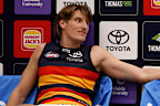 Josh Worrell (left) and Taylor Walker of the Crows chat after a game.