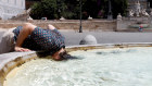 Struggling to cope at the Piazza del Popolo in Rome.