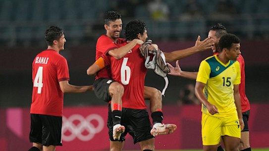 Egypt celebrate their 2-0 victory over the Olyroos in Sendai, Japan.