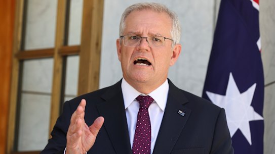 Prime Minister Scott Morrison outlines the new rules at a press conference at Parliament House. 