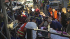 Civil Defence first responders carry a man who was wounded after his handheld pager exploded in the southern port city of Sidon, Lebanon. 