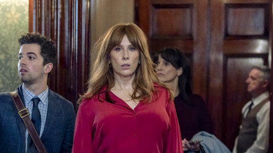 Tate as Queen Georgiana with her personal assistant Matthew (William McKenna).