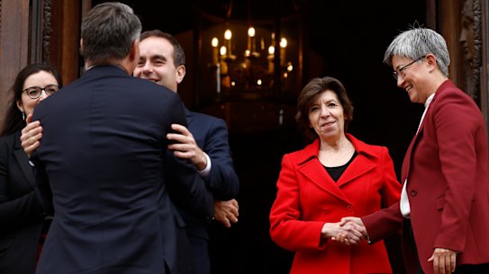 French Foreign Minister Catherine Colonna, second right, and French Defense Minister Sebastien Lecornu, second left, welcome Defence Minister Richard Marles and Foreign Minister Penny Wong.