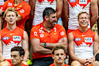Coach Dean Cox and Isaac Heeney with members of the Sydney Swans AFL team in January 2026.