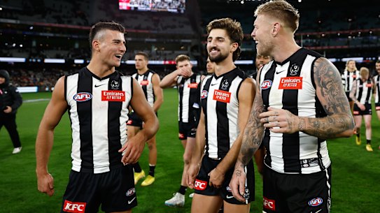 Nick Daicos with Josh Daicos and Jordan De Goey after the Magpies’ win over Sydney.