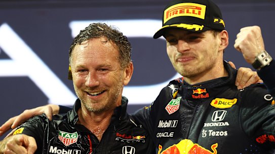 Christian Horner (left) celebrates with 2021 F1 World Drivers at the Abu Dhabi Grand Prix last December.