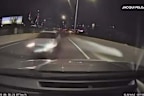 A 51-year-old woman has been charged over a wrong-way crash on a Melbourne bridge that was millimetres from being a head-on disaster.