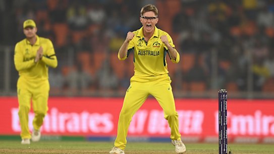 Australian spinner Adam Zampa of Australia celebrates the wicket of Moeen Ali of England.
