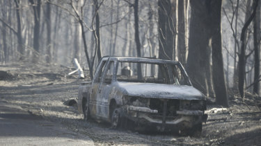Burnt out car during the Tathra bushfire on the NSW south coast