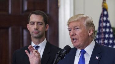 Senator Tom Cotton, left, could continue "Trumpism", say those campaigning against US President Donald Trump.
