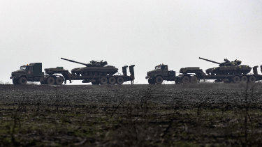 Ukrainian tanks are transported towards to the Luhansk region of Ukraine in December amid increasing Russian threats. 