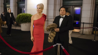 Kellyanne Conway and her husband, George, arrive for a dinner at Union Station in Washington, the day before Trump's inauguration in 2017.