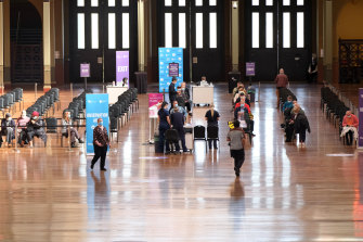 Mass vaccination hubs, such as the one in the Melbourne Exhibition Building, are a key part of the program to protect Australians from COVID-19.