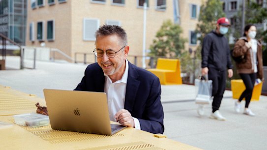 Dr Norman Swan sits down to his roast duck lunch outside the ABC in Ultimo. 