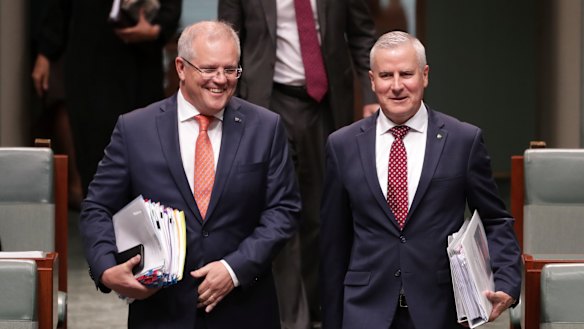 Prime Minister Scott Morrison and Deputy Prime Minister Michael McCormack entering Parliament for question time on Wednesday.