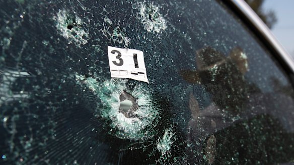 The windshield of mayoral candidate Guillermo Valencia is shattered after an attack in Morelia, Michoacan state, Mexico, last month.