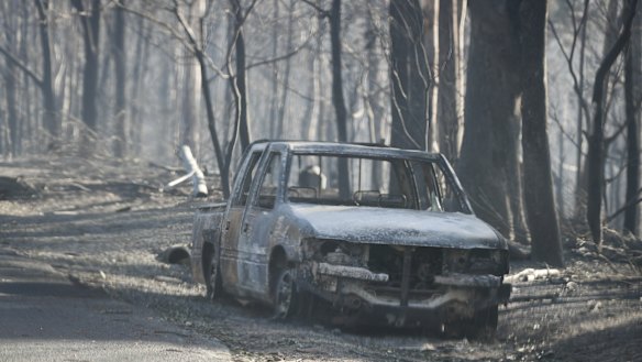 Burnt out car during the Tathra bushfire on the NSW south coast