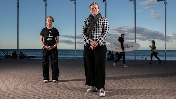Surfing legend Layne Beachley and Warringah MP Zali Steggall at Manly beach. They are calling on the government to back a bill to ban offshore drilling in the area.
