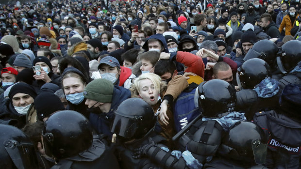 Demonstrators clash with police on Saturday during a protest against the jailing of opposition leader Alexei Navalny.