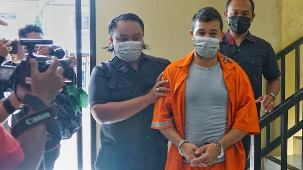 Australian-Italian dual citizen Antonio Strangio, 32, is transferred by police in Bali on Wednesday. 