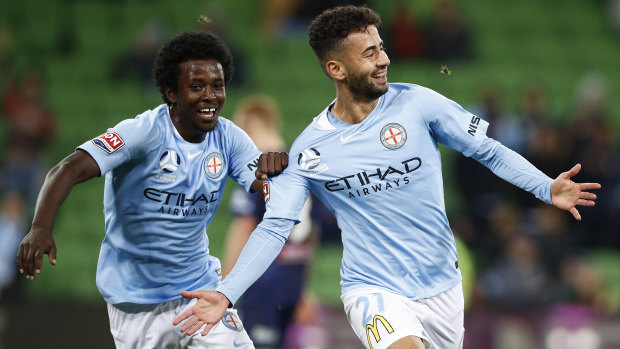 Idrus Abdulahi (left) made his debut for City against the Mariners.